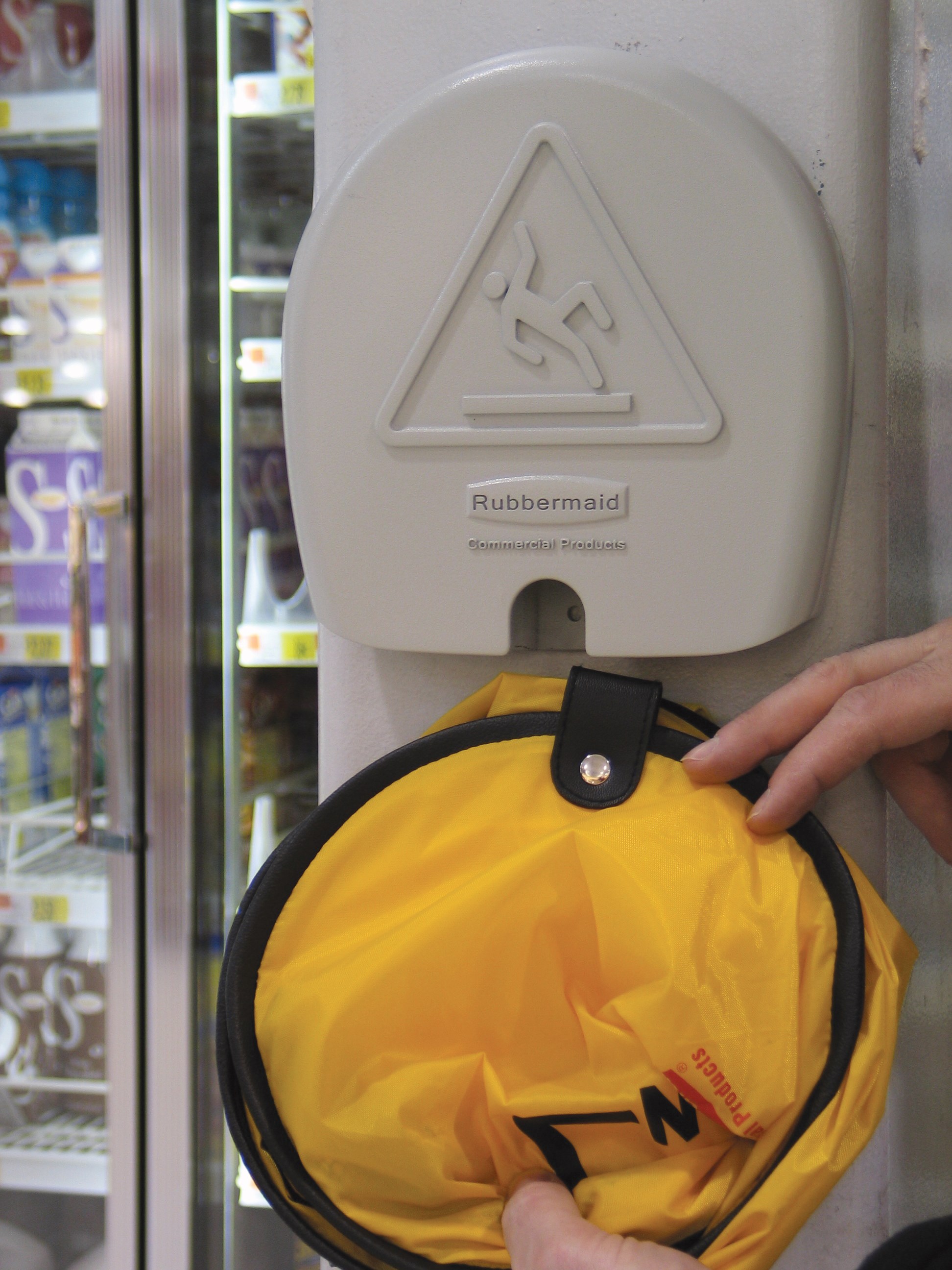 Large cone folds with a simple twist and slides into compact shell for handy storage. Multilingual safety communication utilizes ANSI/OSHA-compliant color and graphics.