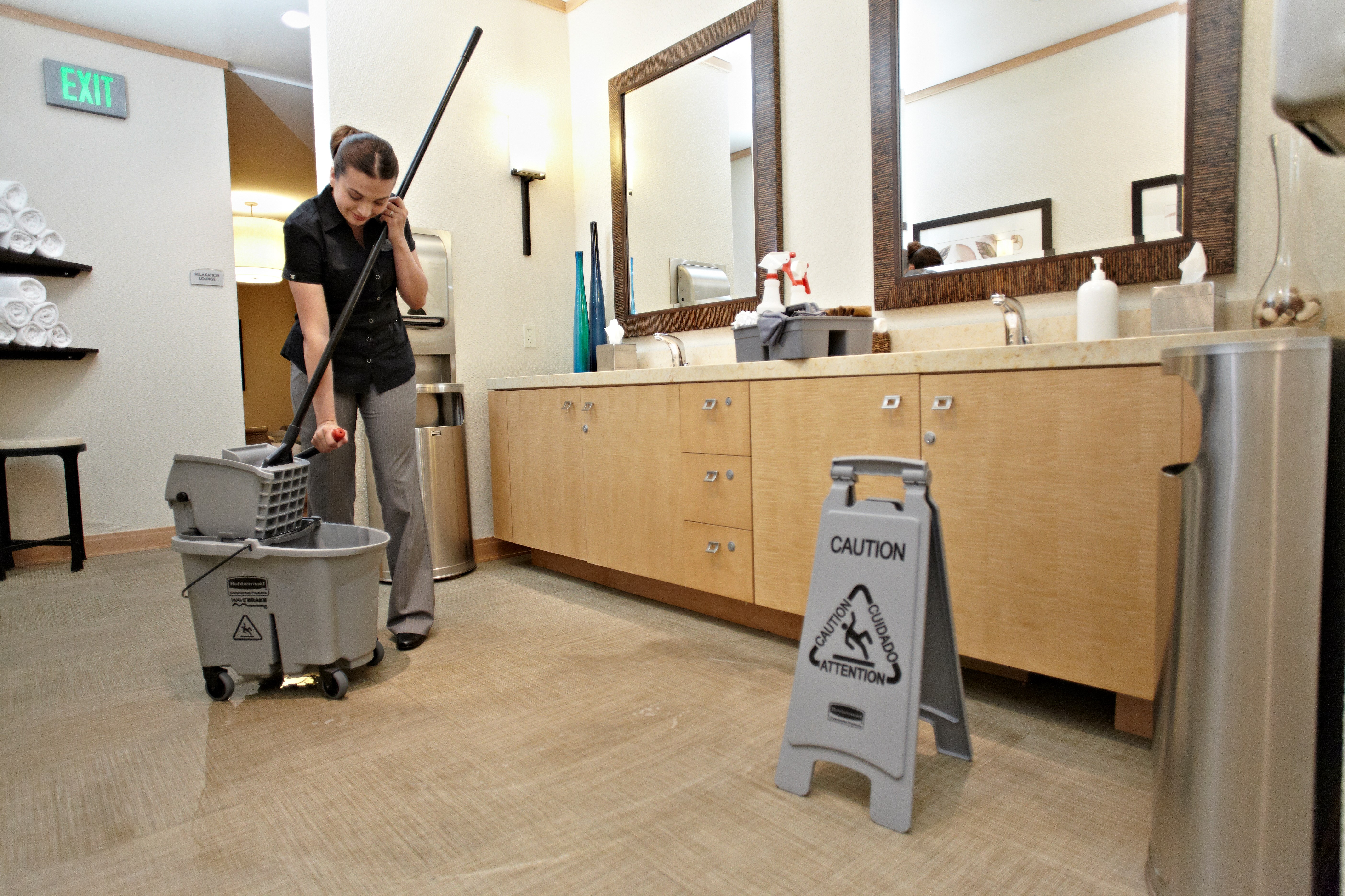Sleek, lightweight "Caution" sign is 2-sided for effective multilingual safety communication that won't disrupt a building's image.
