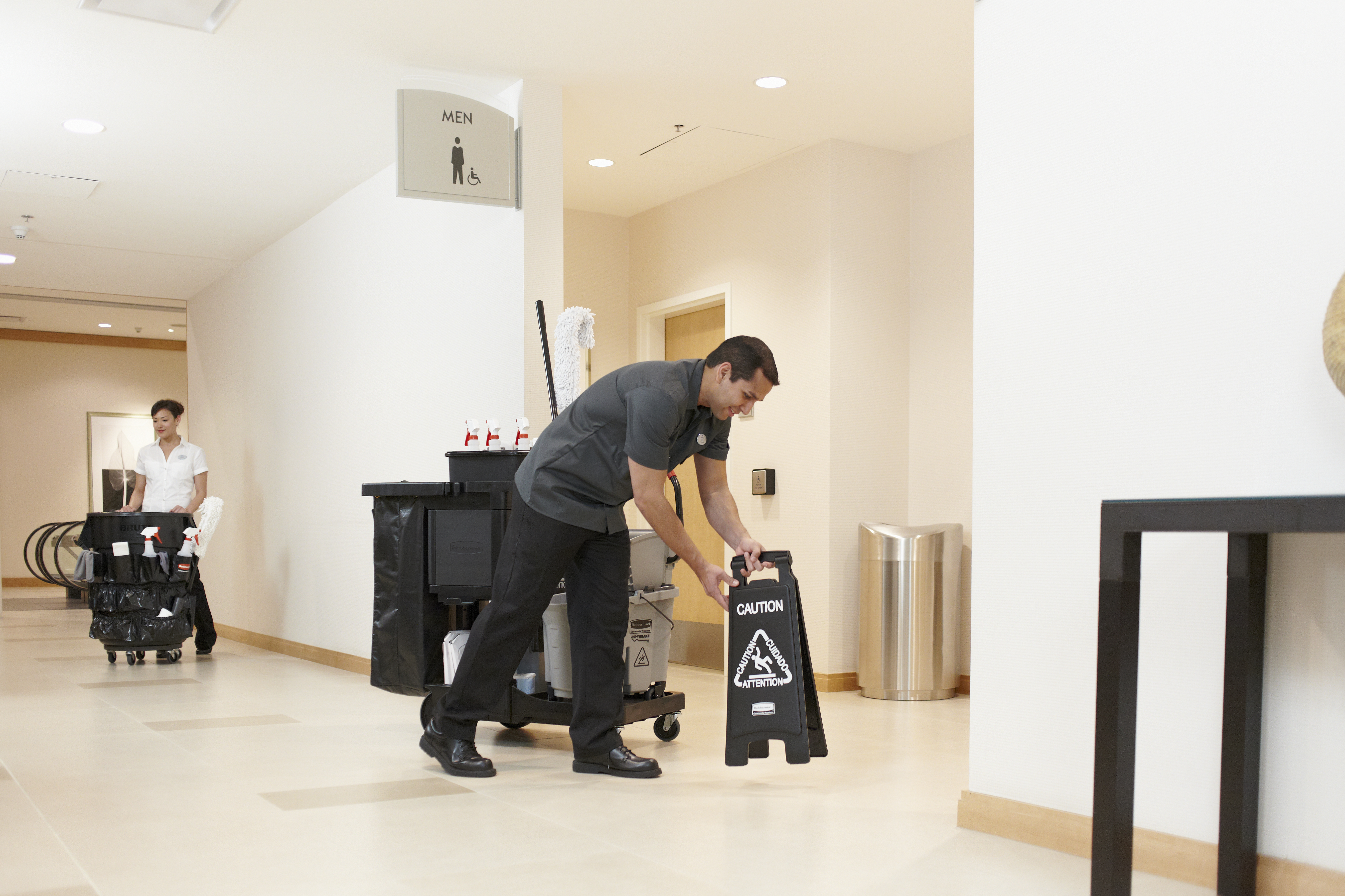 Sleek, lightweight "Caution" sign is 2-sided for effective multilingual safety communication that won't disrupt a building's image.