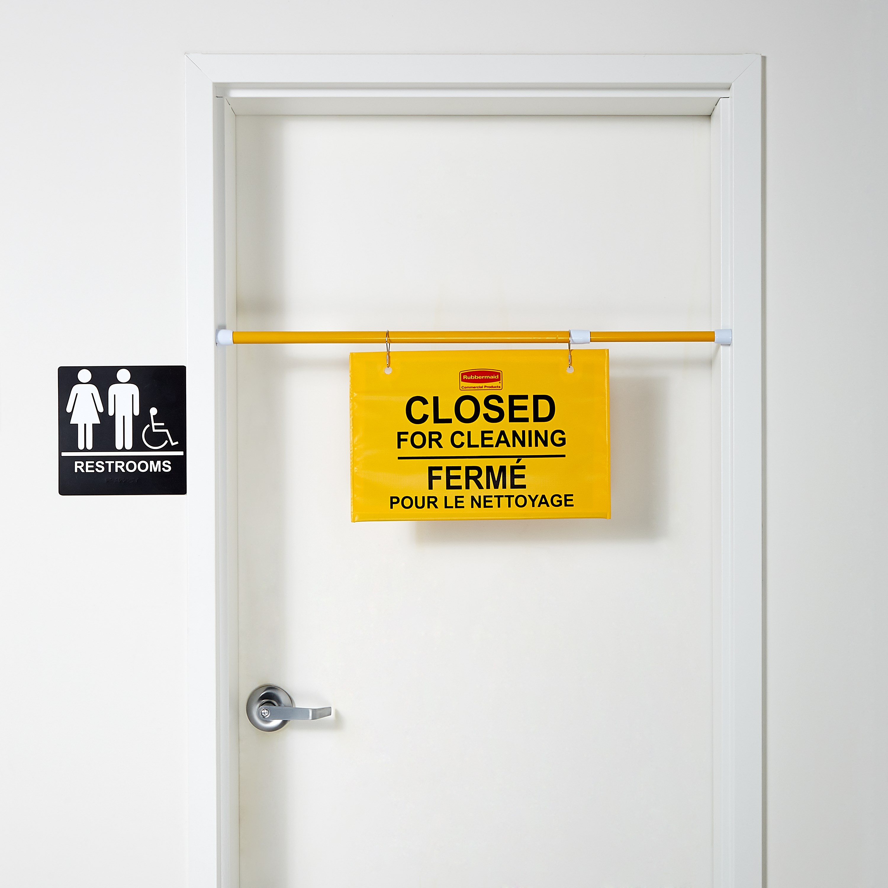 "Closed For Cleaning" hanging sign is on an extendable pole to block doorways and entrances up to 50" wide and utilizes ANSI/OSHA-compliant color