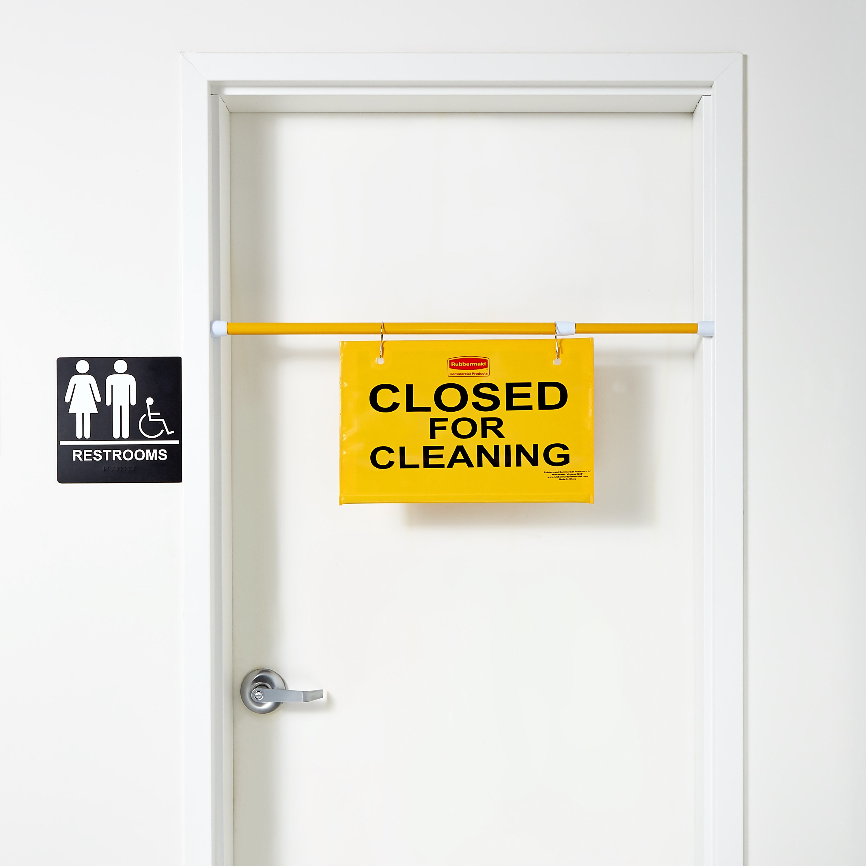 "Closed For Cleaning" hanging sign is on an extendable pole to block doorways and entrances up to 50" wide and utilizes ANSI/OSHA-compliant color