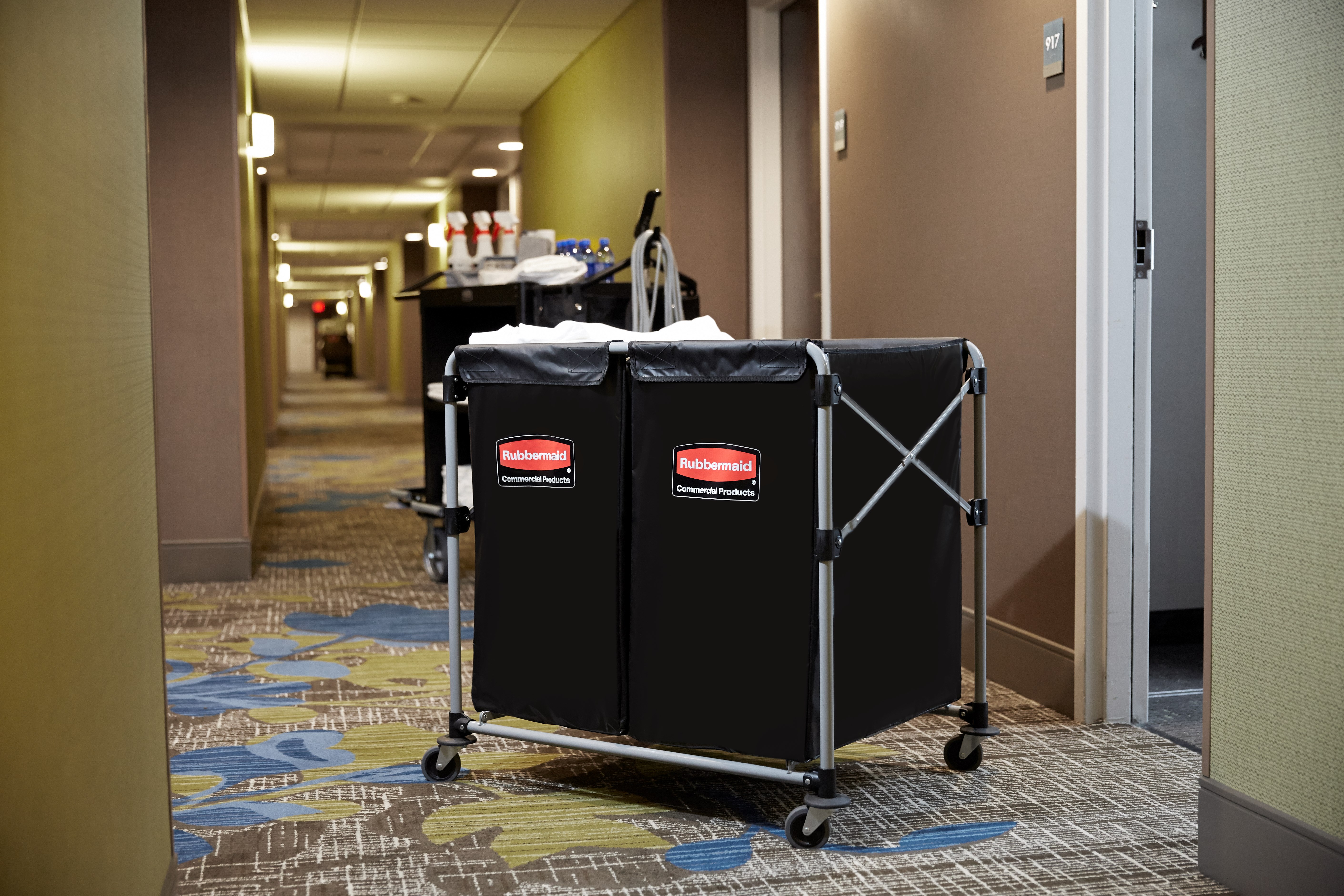 The Rubbermaid Commercial 1881781 Executive Series Multi-Stream, Collapsible X-Cart Basket, Two 4-Bushel bags, 220 lbs load capacity, Black.