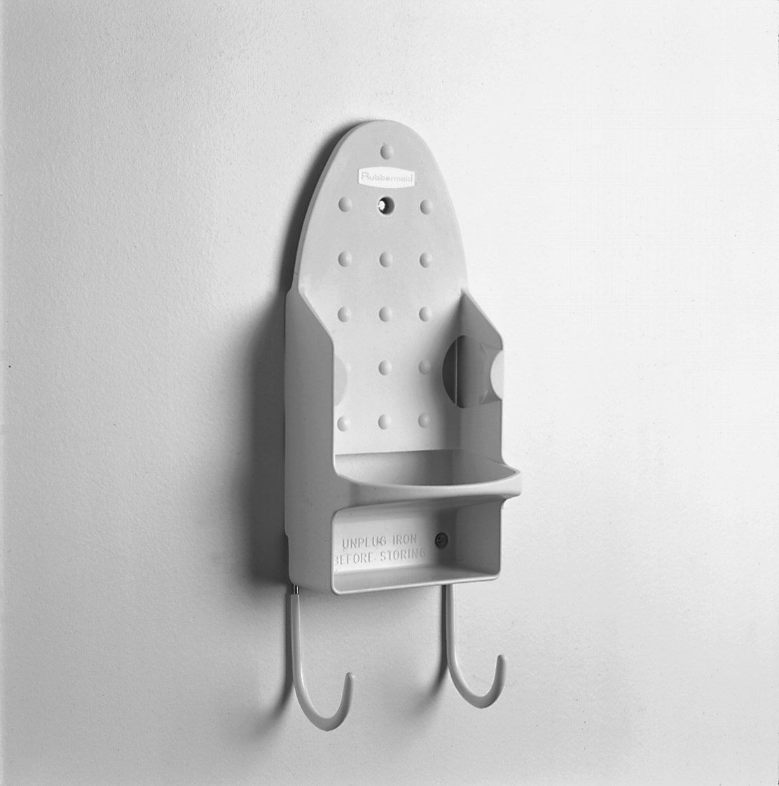 Efficiently stores iron with ironing board for guest convenience to prevent hot iron damage.