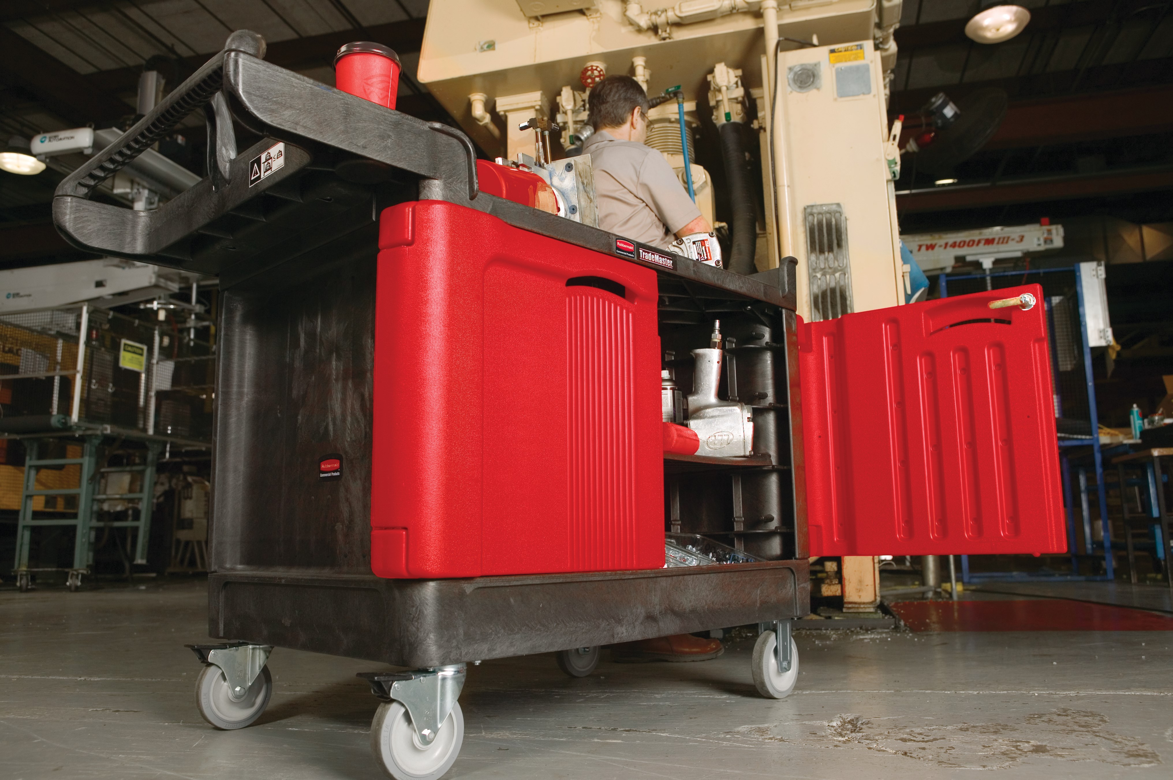 The Rubbermaid Commercial TradeMaster 2-Door Cabinet Utility Cart creates a rolling work center capable of transporting up to 750 lbs. on two 5" non-marking casters and two 5" locking swivel casters.
