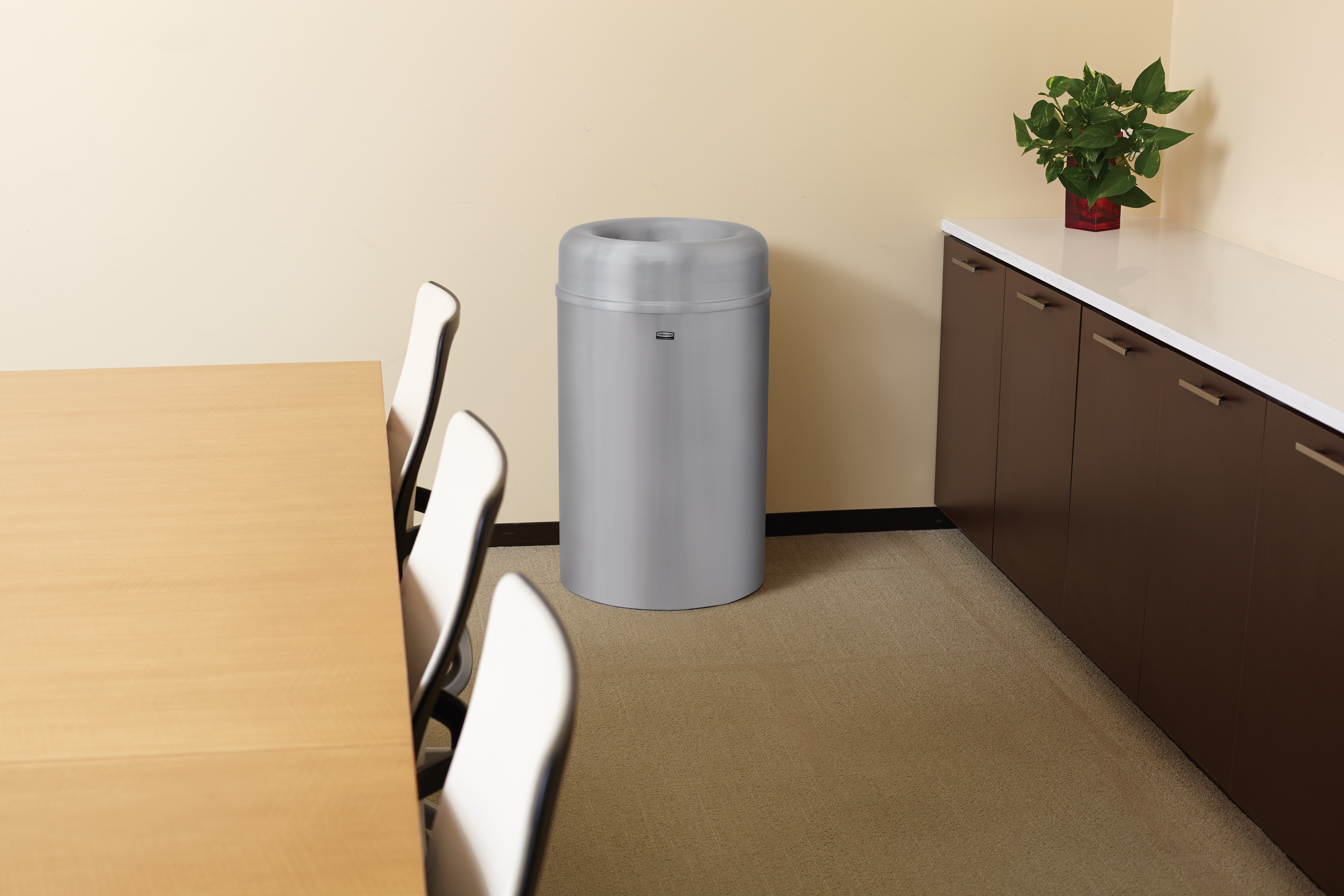 The Crowne Collection 30 Gallon FGAOT30 Decorative Indoor Waste Container has an attractive contemporary design with a curved open top that prevents objects from being placed on top of the can, keeping a neater overall appearance.