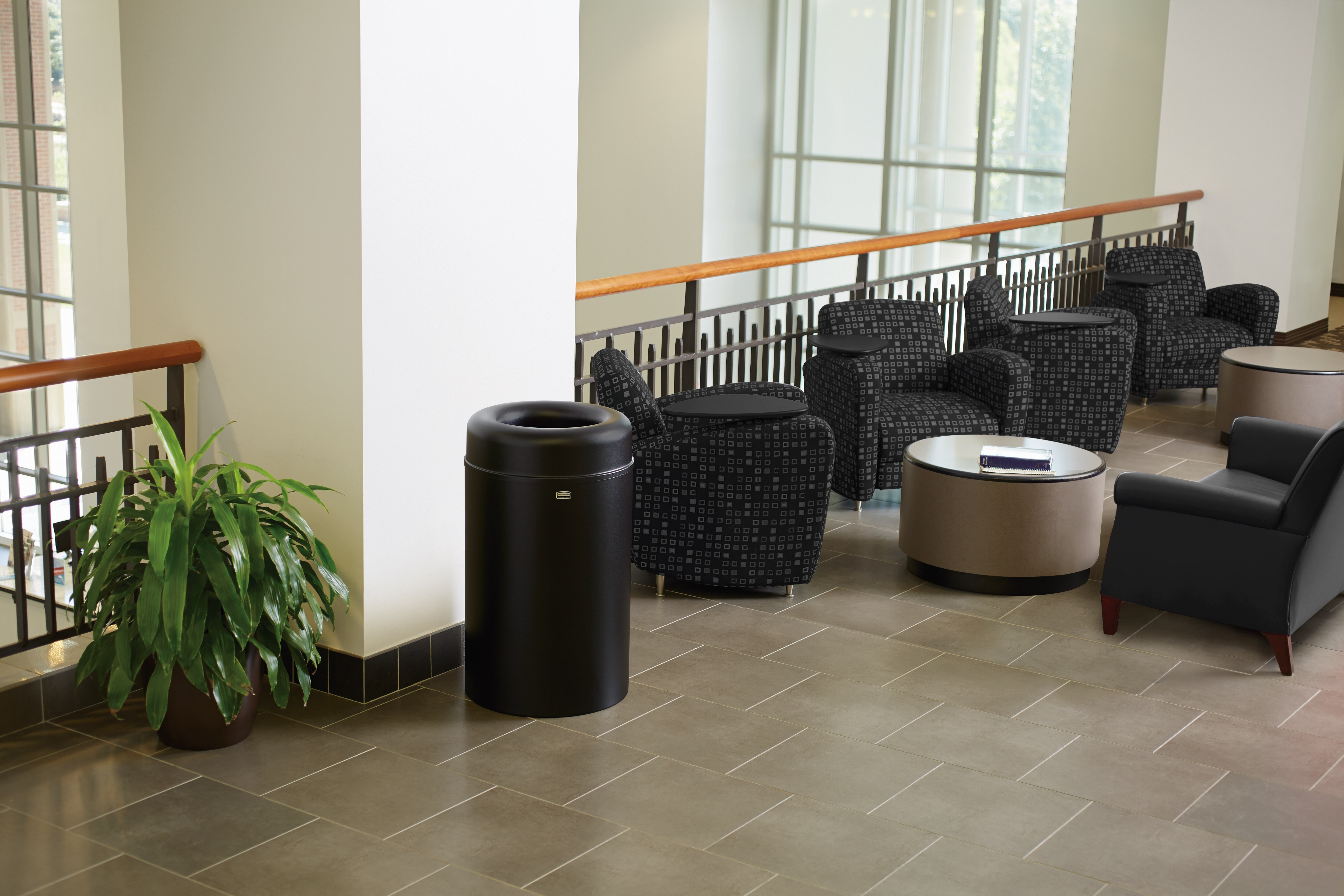 The Crowne Collection 30 Gallon FGAOT30 Decorative Indoor Waste Container has an attractive contemporary design with a curved open top that prevents objects from being placed on top of the can, keeping a neater overall appearance.