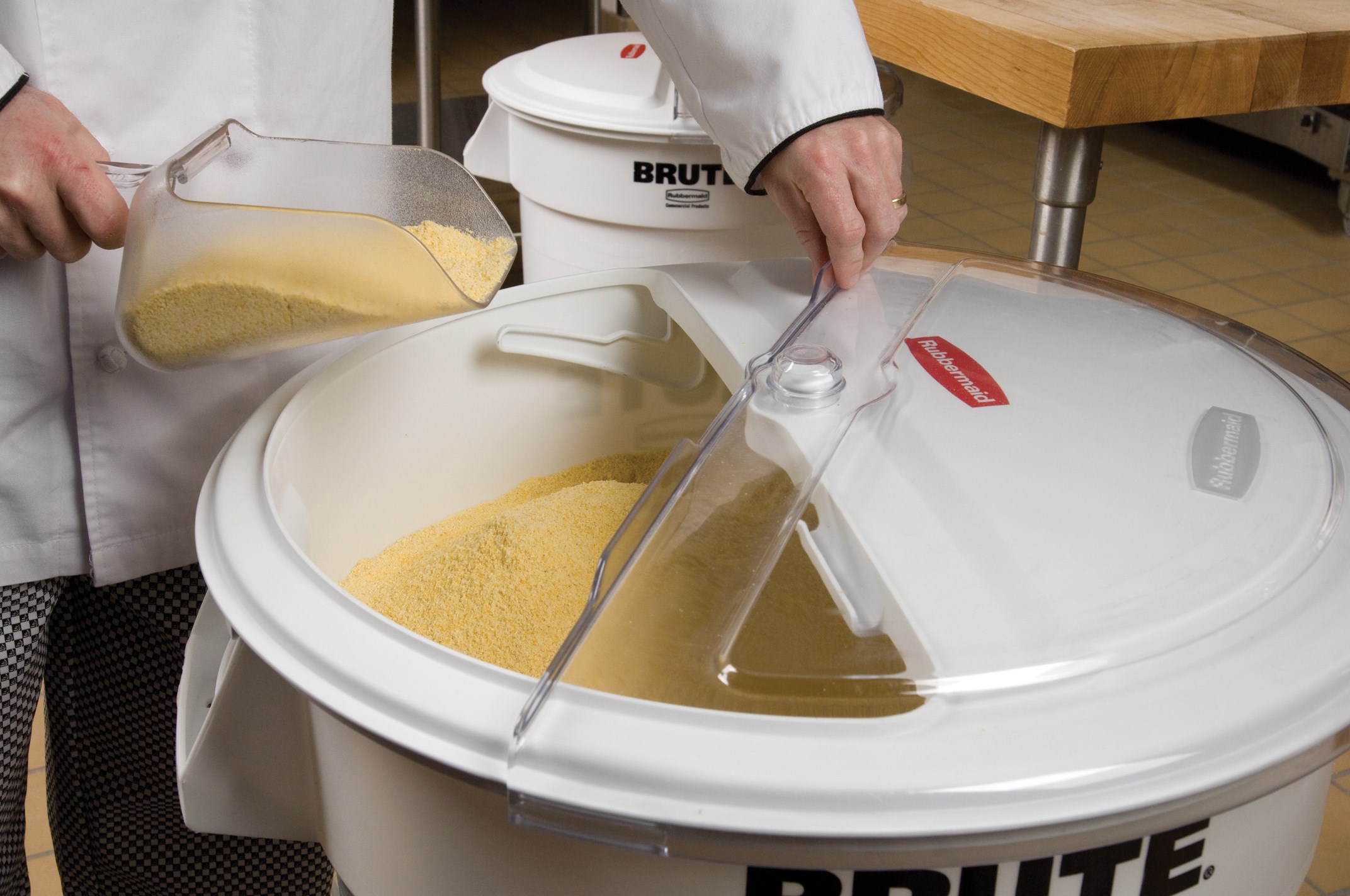 The Rubbermaid Commercial BRUTE® ingredient containers with sliding ProSave® lid and scoop
