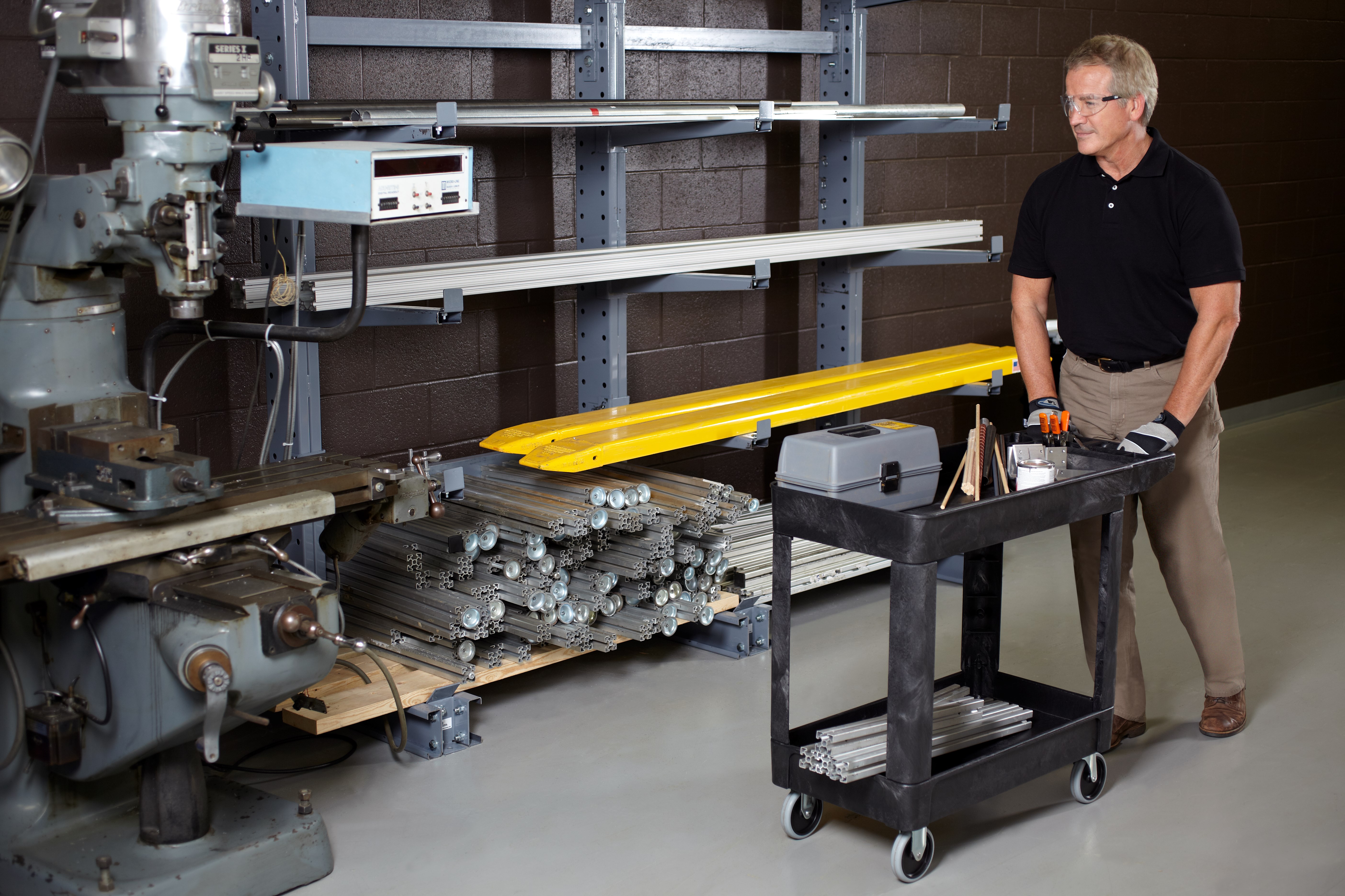 Heavy-Duty Utility Cart with Lipped Shelf transports materials, supplies, and heavy loads securely with up to 500 lbs. load capacity. The lipped shelves prevents items from falling off the cart and features an integrated V-notch to hold pipe and conduit securely for safe cutting.