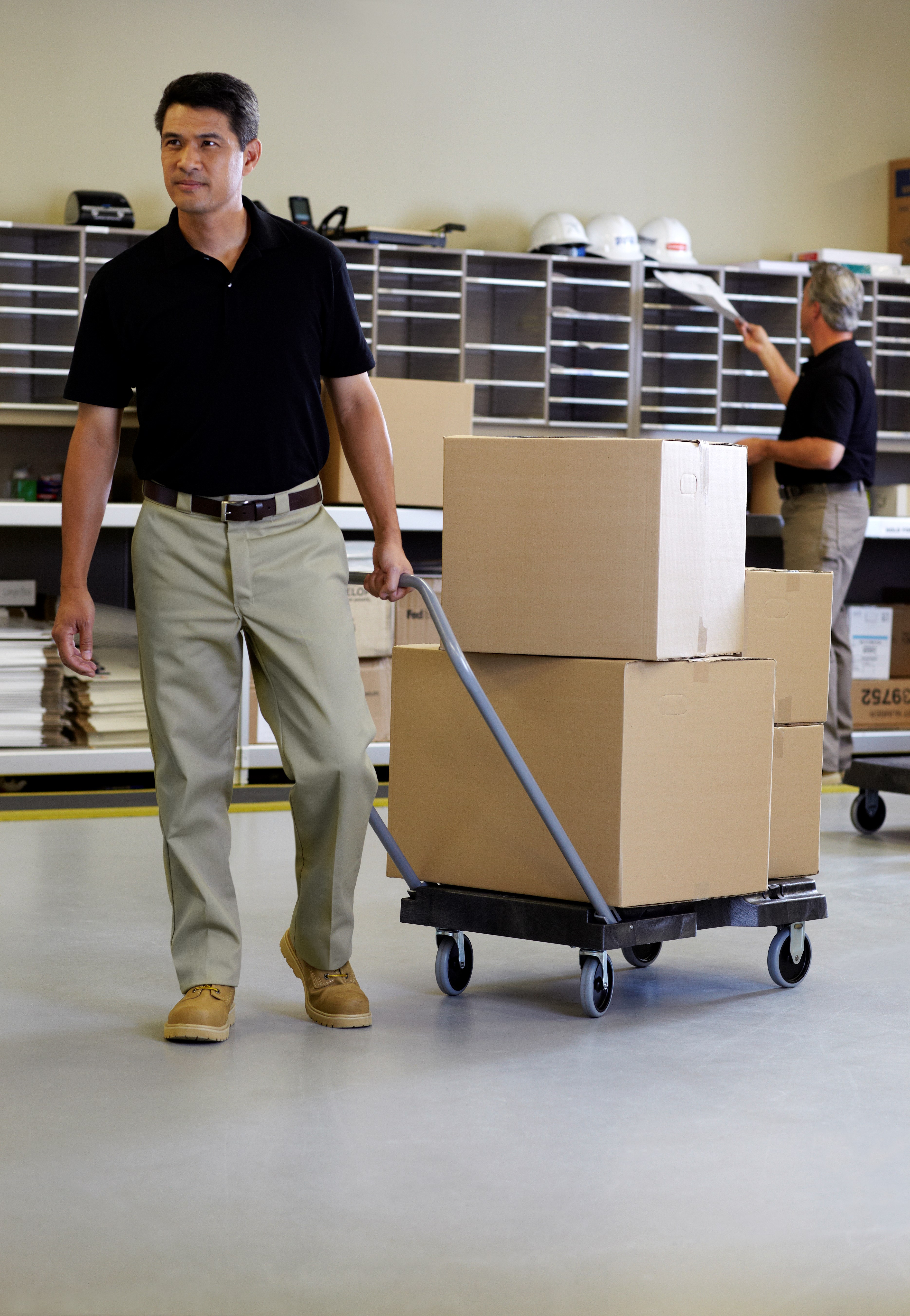 The Rubbermaid Commercial Triple Trolley efficiently transports large bulky loads and then folds flat for easy storage.