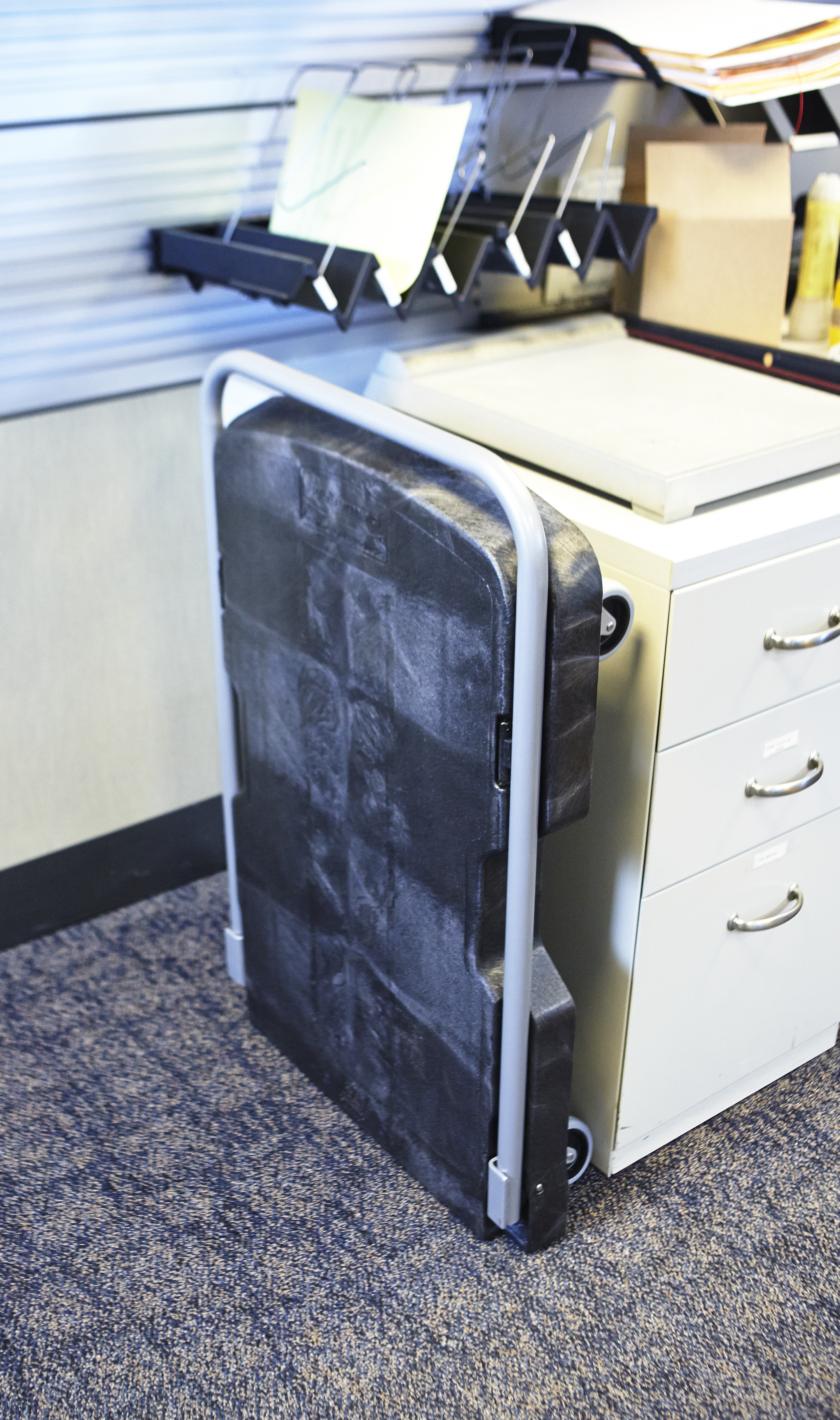 The Rubbermaid Commercial Triple Trolley efficiently transports large bulky loads and then folds flat for easy storage.